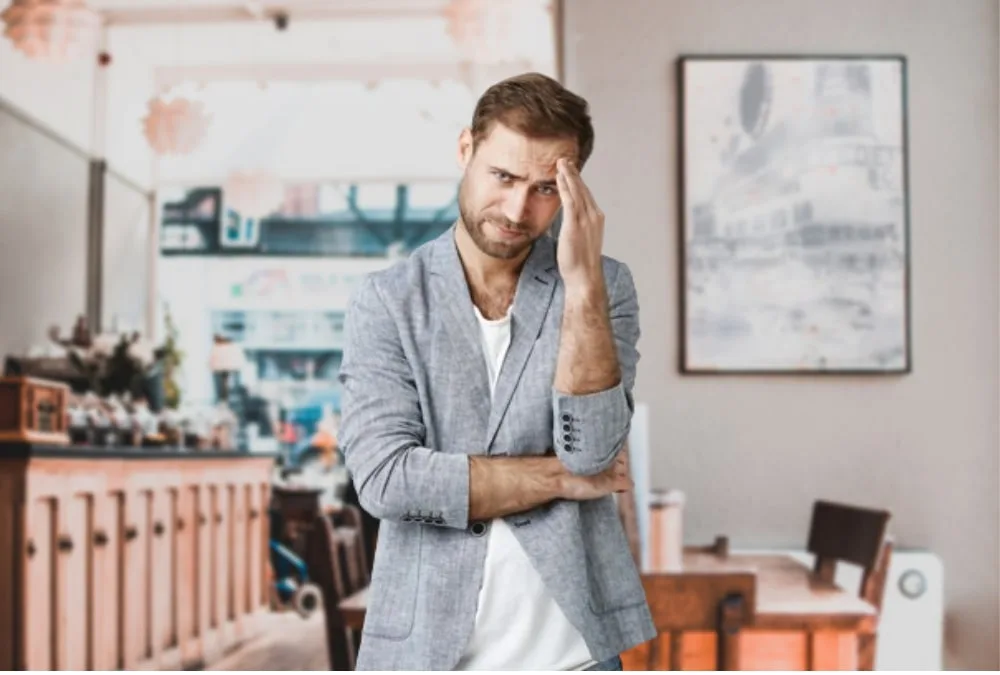 Image showing a man contemplating with question marks above his head, representing the topic of side effects of daily masturbation in males.